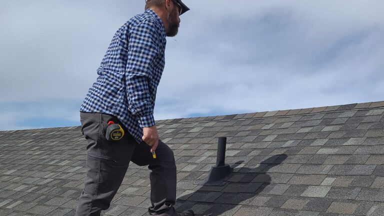Ken inspecting a roof