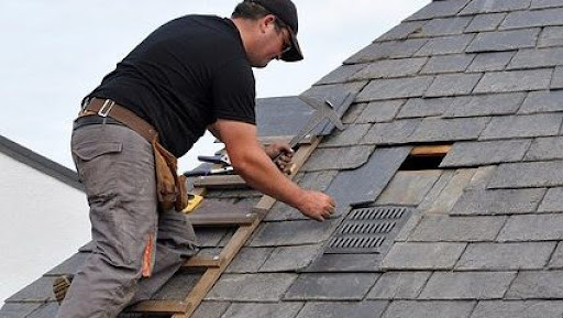 303 roofer repairing a roof after the latest stroms