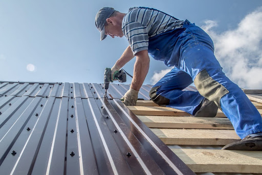 screwing down metal roofing panel