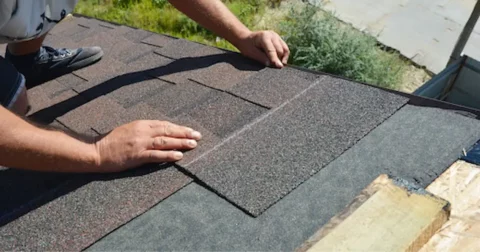 asphalt shingles being installed on a denver roof